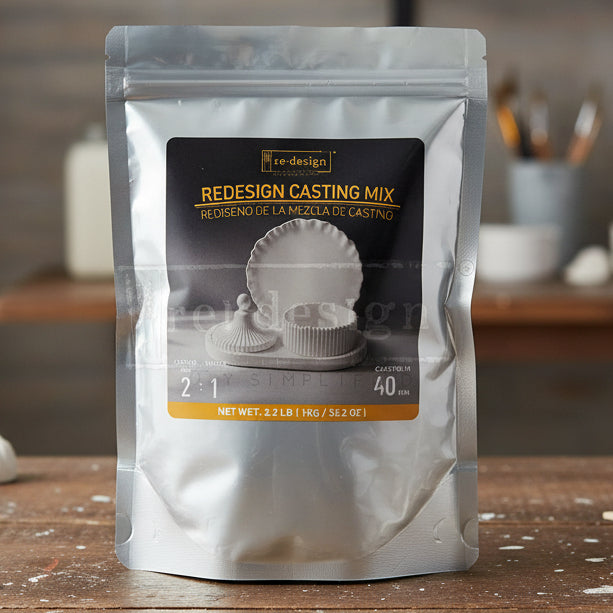 Bag of Redesign Casting Mix shown on a work table.