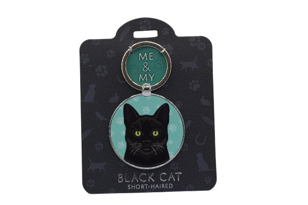 Keychain with black cat design on a branded card