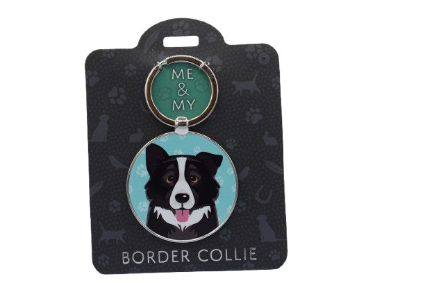 Keychain with a Border Collie design on a black card with brand name.