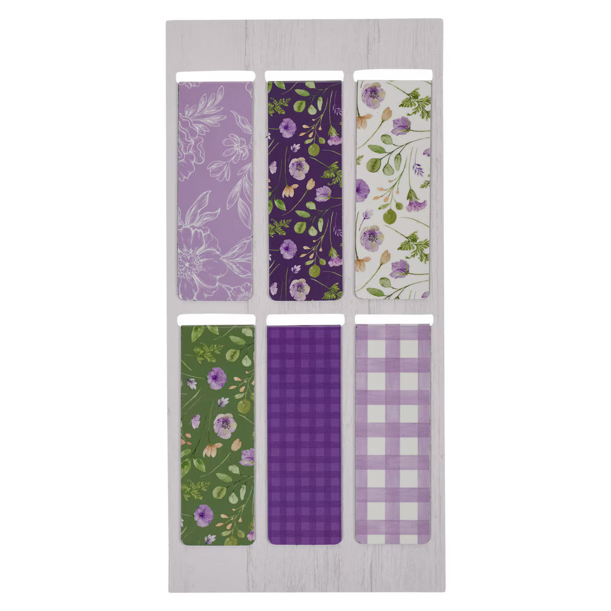 Set of fabric swatches with purple and green floral patterns