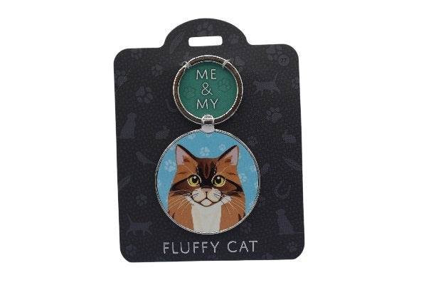 Cat-themed keychain on a black card with 'Me & My Fluffy Cat' text