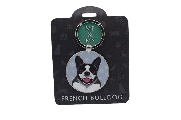 Keychain with a French Bulldog design on a black card with brand name.