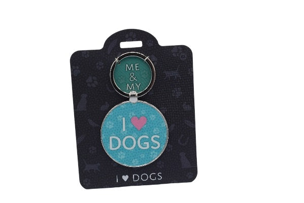 Pet tag with 'I ❤️ DOGS' text on a black card with paw prints.