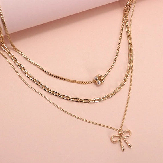 Multi Layer Pearl Bow Charm Necklace