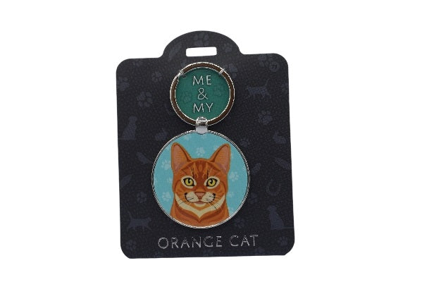 Keychain with an orange cat illustration on a black card with 'ME & MY' text.