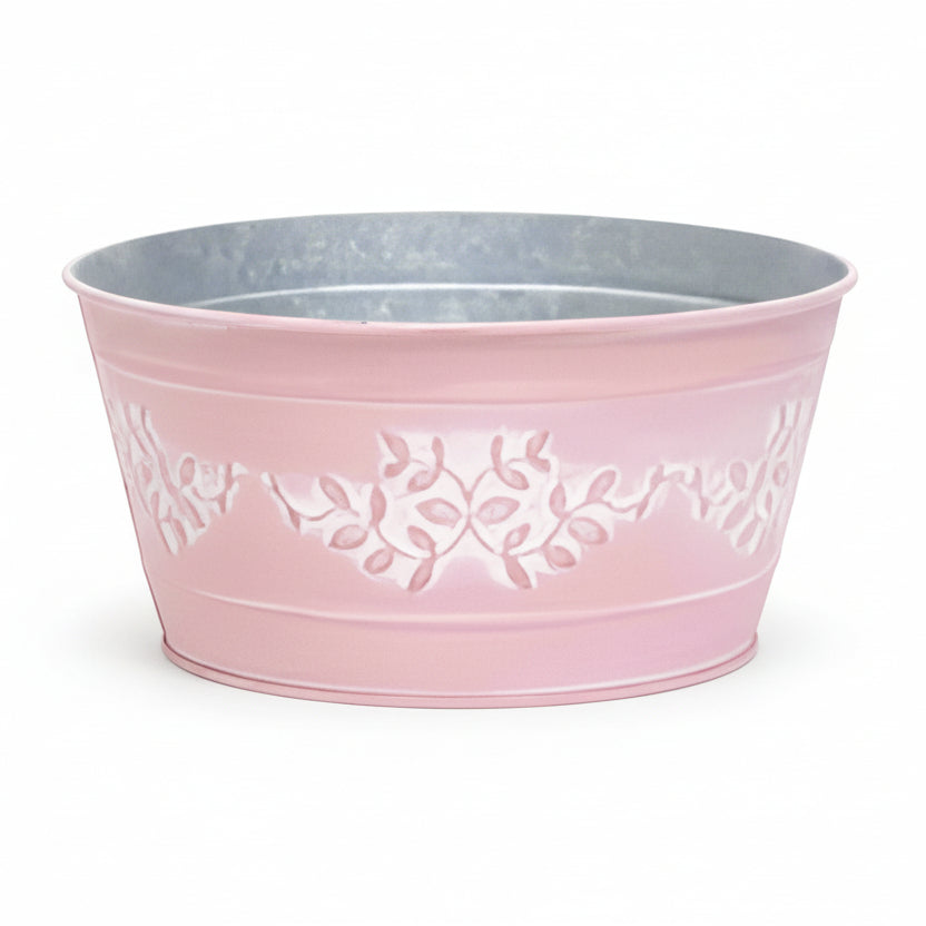 A pink metal embossed bucket on a white background.