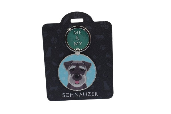 Keychain with a Schnauzer design on a black card with brand name.