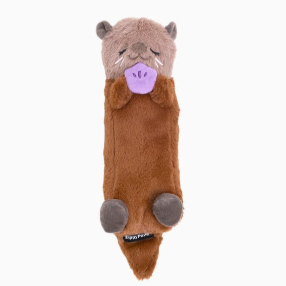 Plush toy otter on a white background