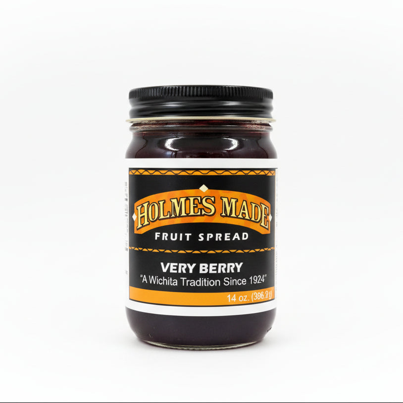 A jar of Holmes Made Very Berry Fruit Spread on a white background
