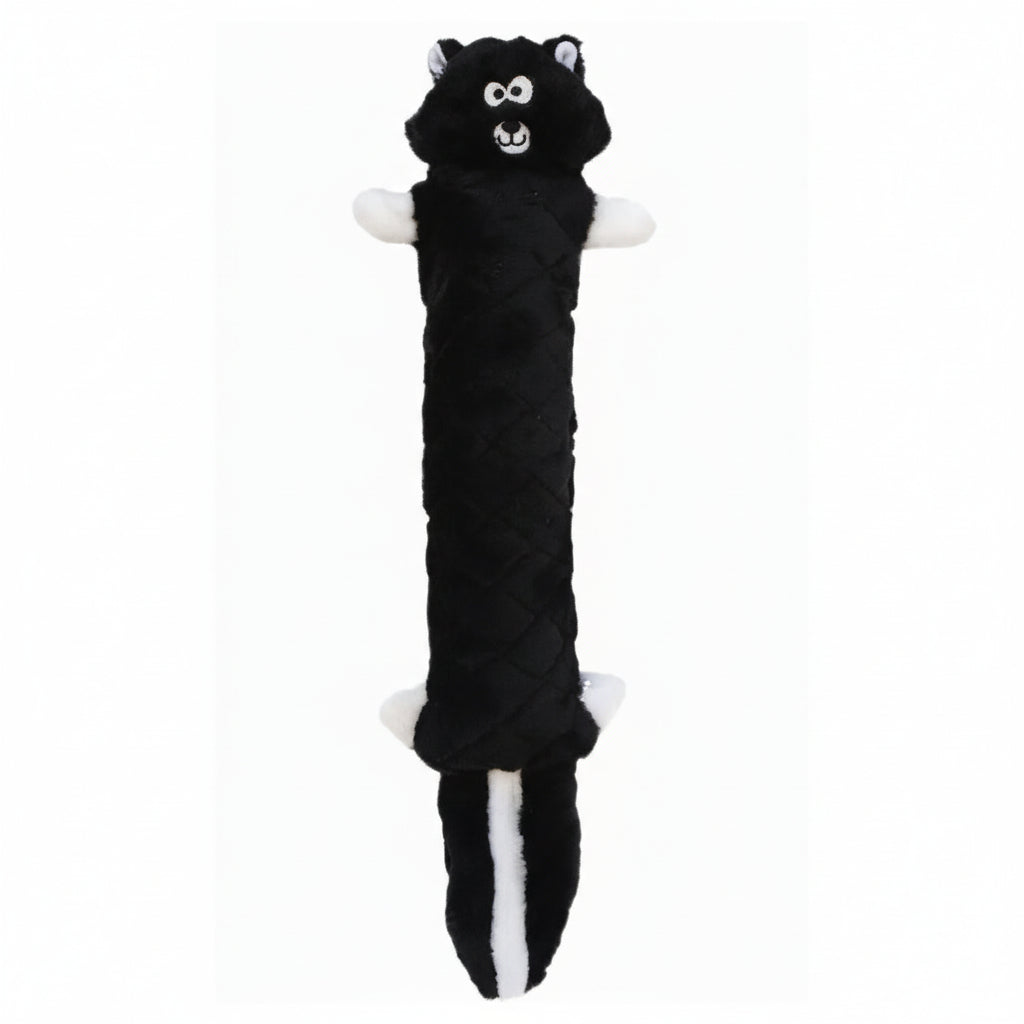 A black and white dog toy designed to resemble a skunk, with a cylindrical body and a head featuring white ears and black eyes.