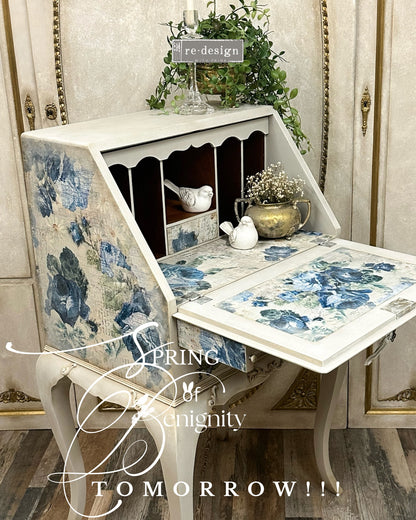 Meadow Melodies decoupage paper shown on a drop down desk in a room with decorative elements.