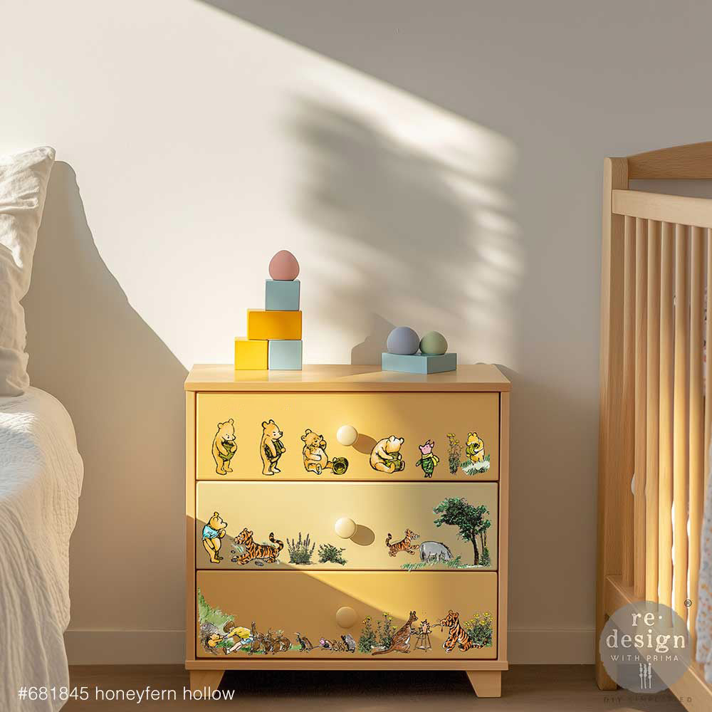 A small children's dresser with the Honeyfern Hollow transfer in a nursery.