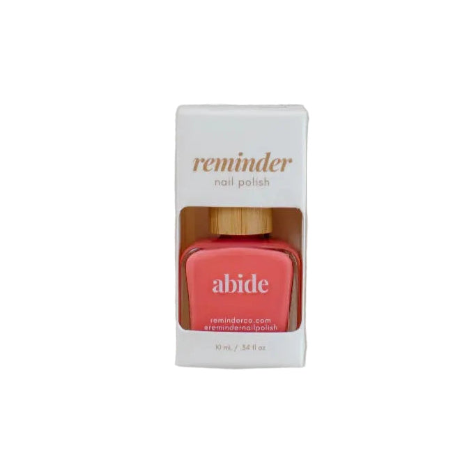 Box of 'abide' nail polish with a white background.