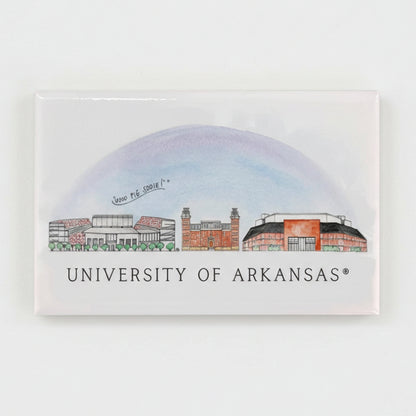 rectangular magnet with drawing of the University of Arkansas skyline featuring 3 buildings