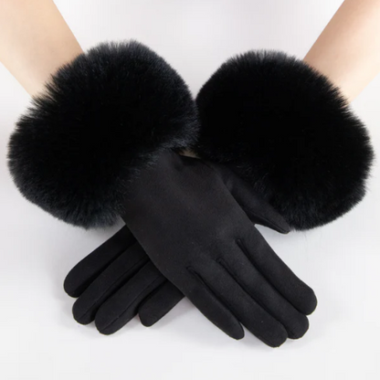 Black gloves with fur cuffs on a white background