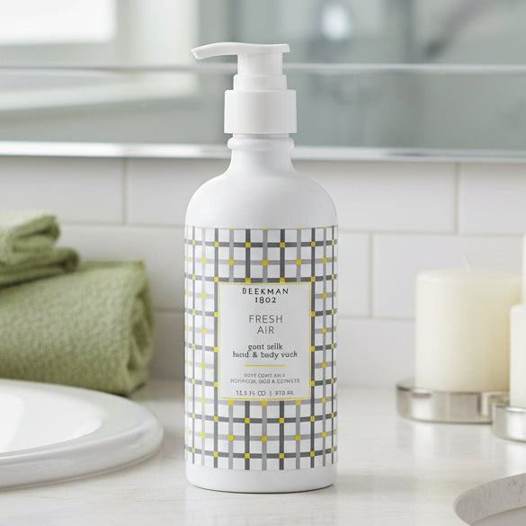 Bottle of Beekman 1802 hand and body wash with a checkered design