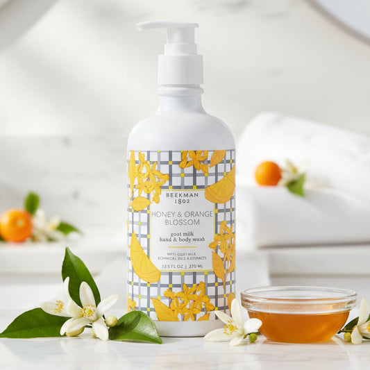 Bottle of hand and body wash with a floral design