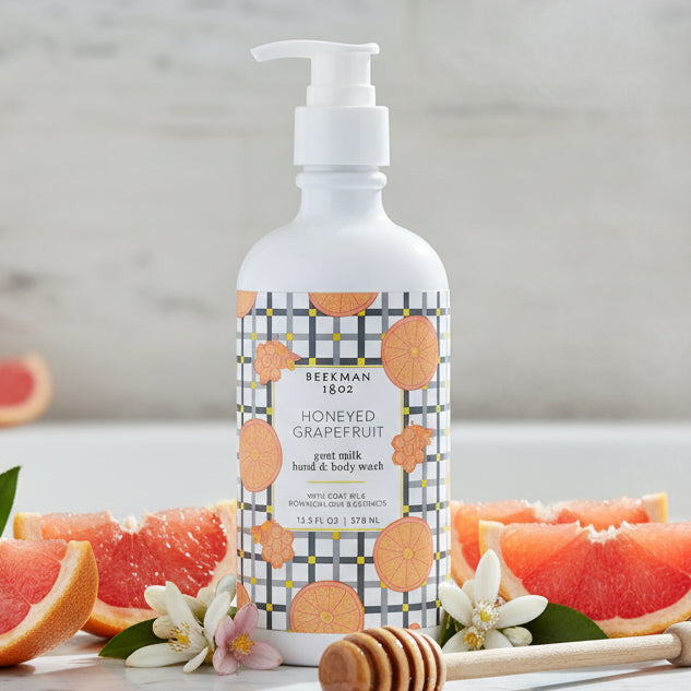 Hand and body wash bottle with honeyed grapefruit design