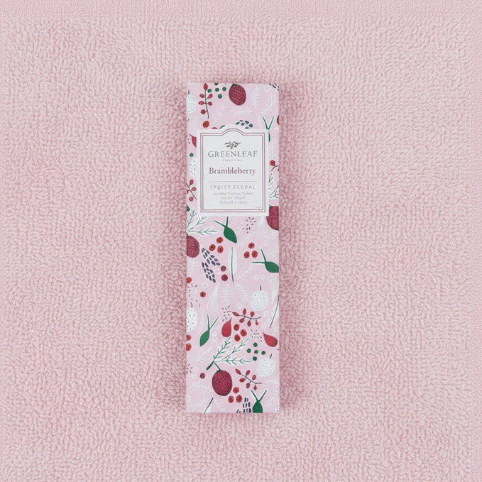 Greenleaf Brambleberry slim sachet on a pink towel.