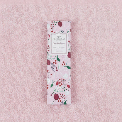 Greenleaf Brambleberry slim sachet on a pink towel.