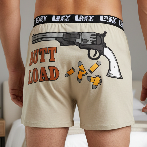 Beige shorts with a graphic of a gun and 'Butt Load' text, featuring the brand 'Lazy One', on a white background.