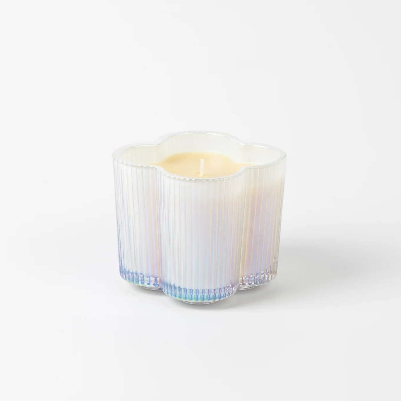 Sweet Grace candle in a ribbed glass container on a white background