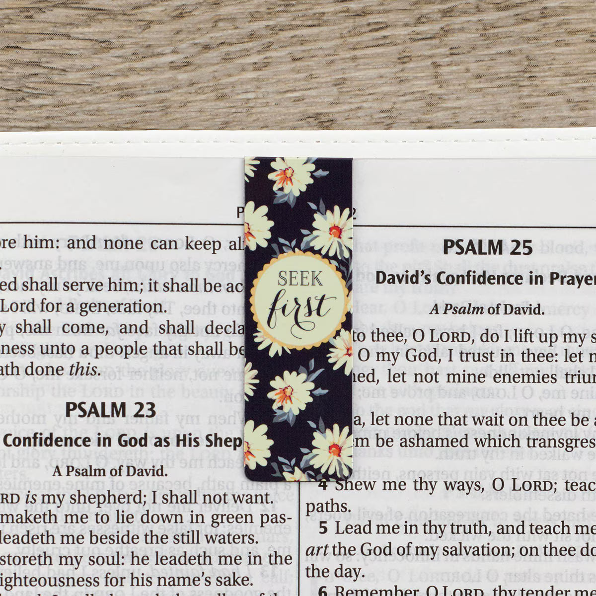 Floral bookmark with 'Seek first' text on a Bible page