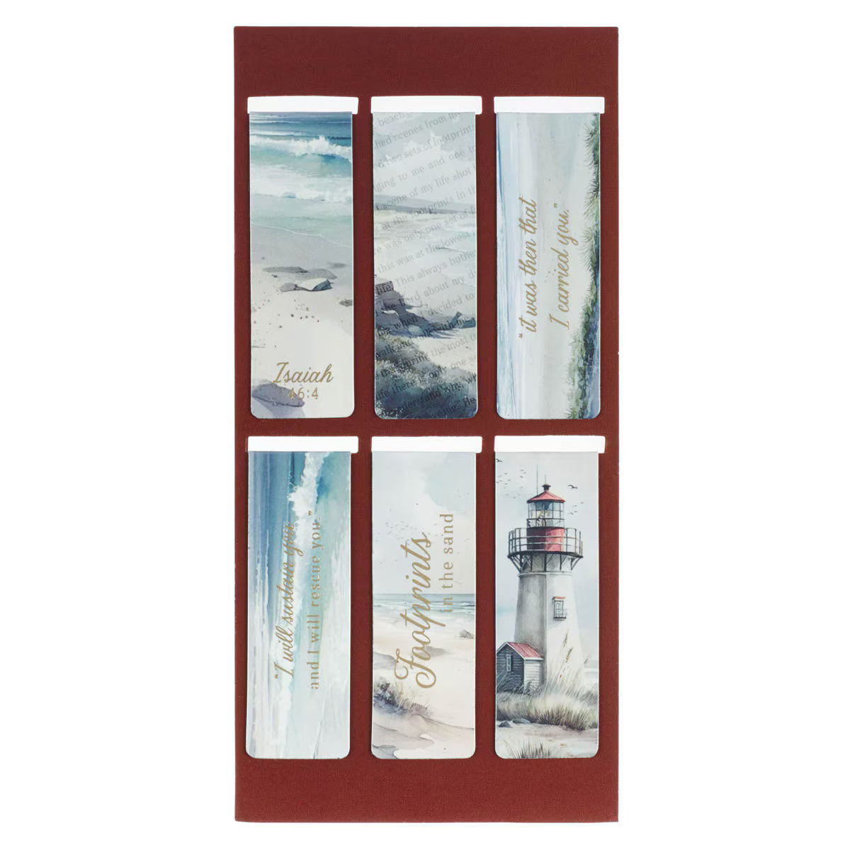 Set of six scenic bookmarks with lighthouse and beach designs in a red holder.