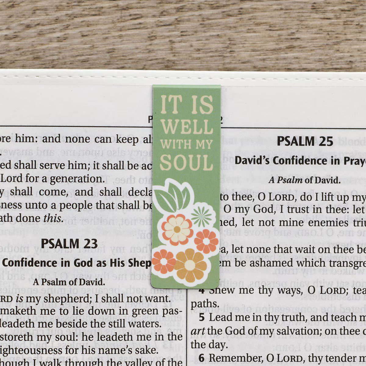 Decorative bookmark with floral design on a Bible