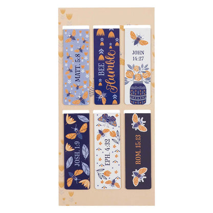 Set of colorful bookmarks with designs and text on a tan card