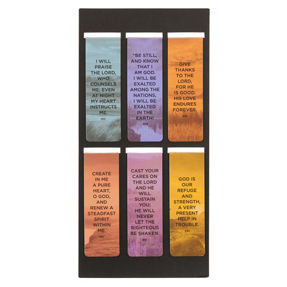 Set of six colorful bookmarks with inspirational quotes on a black background