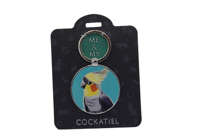 Keychain with cockatiel design on a black card