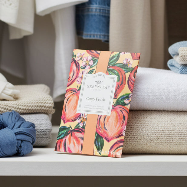 Greenleaf Coco Peach sachet on a closet shelf