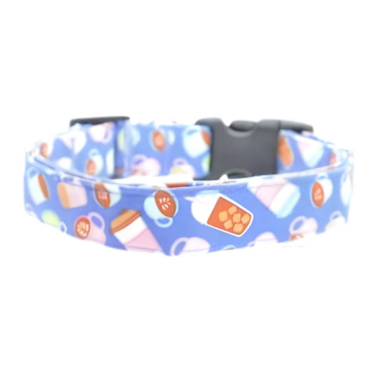 Dog collar with colorful mug pattern on a blue background