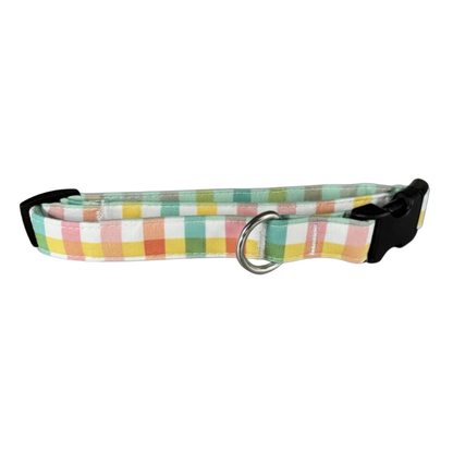 coral teal plaid patterned dog collar with a black buckle on a white background