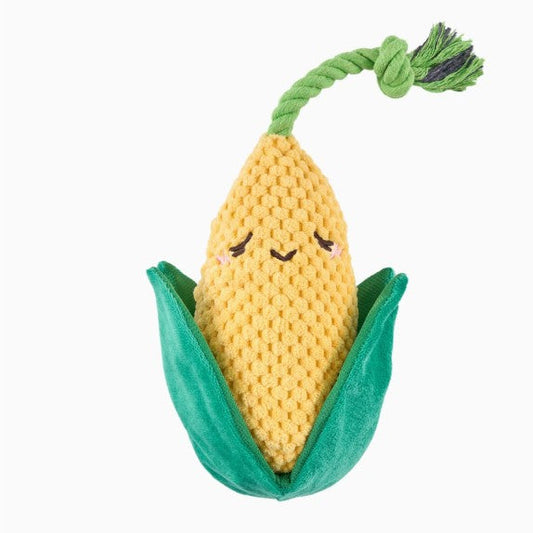 Corn-shaped plush dog toy with a rope on a white background
