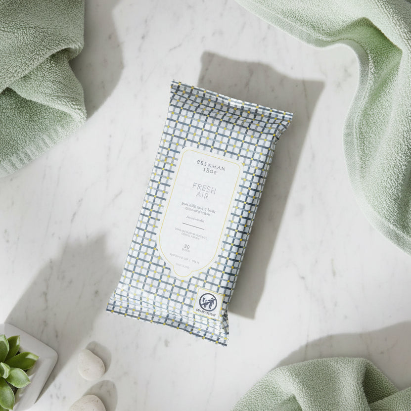 Pack of Beekman 1802 Fresh Air wipes with checkered design