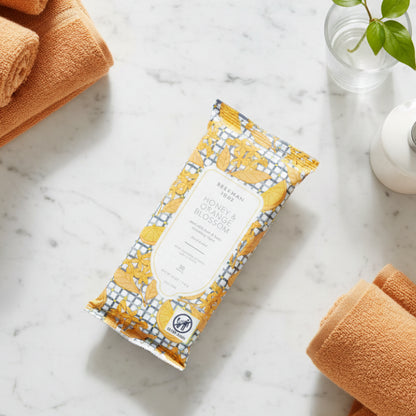 Pack of Beekman 1802 Honey & Orange Blossom wipes with floral design