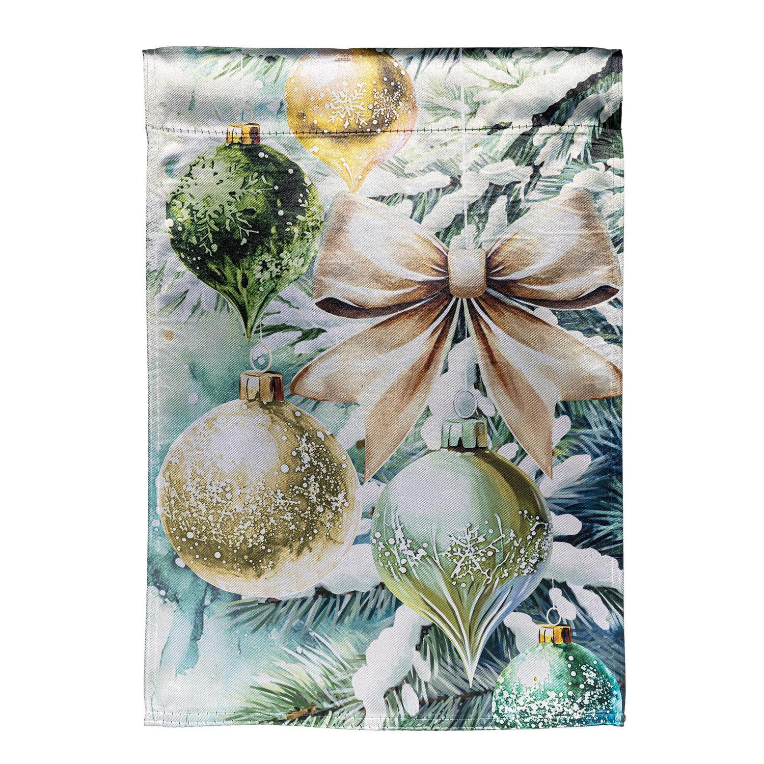 Decorative garden flag with Christmas ornaments and bows.