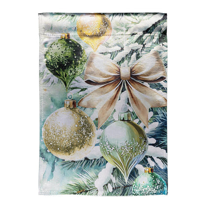 Decorative garden flag with Christmas ornaments and bows.