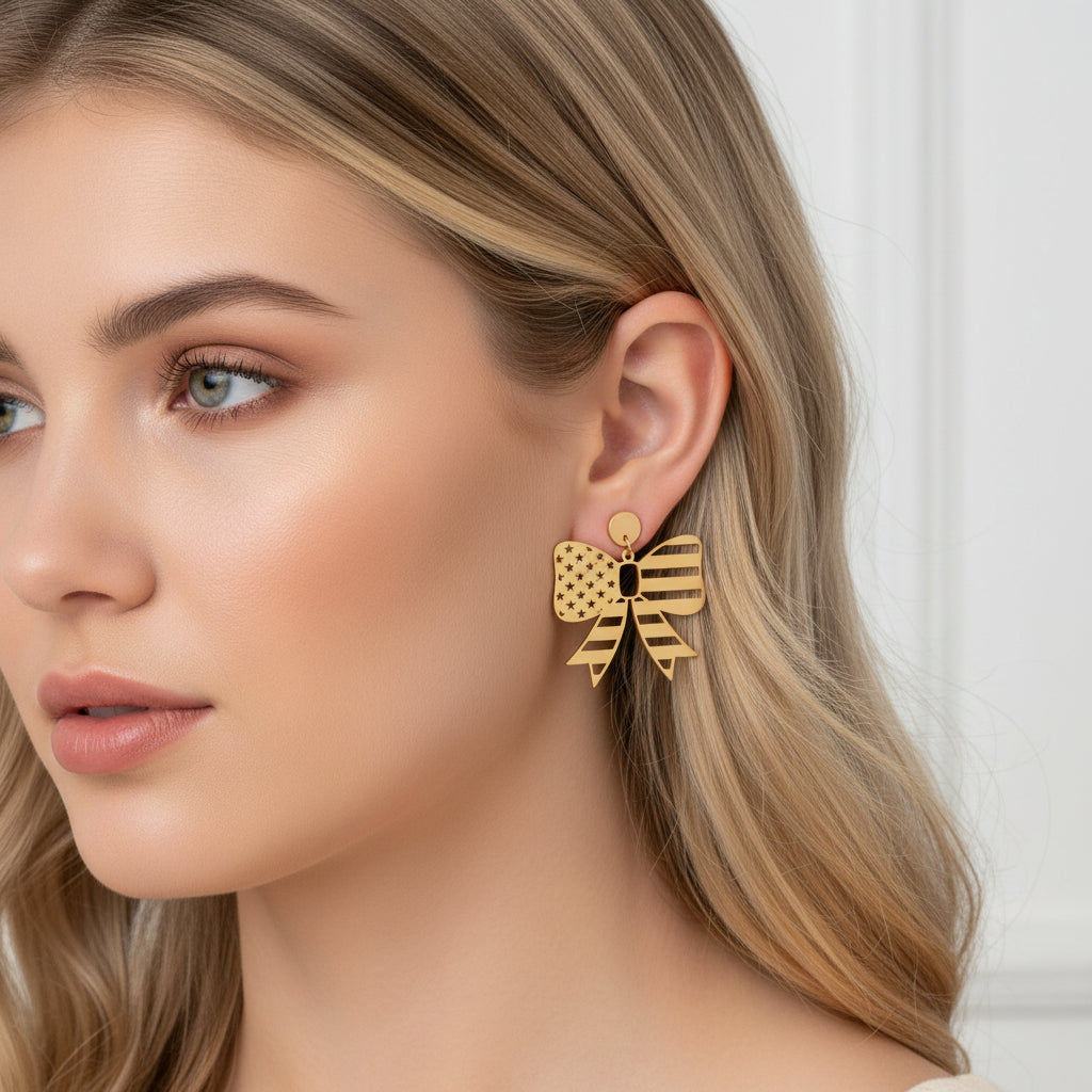 Fourth of July Star Stripe Bow Matte Gold Earrings on a woman