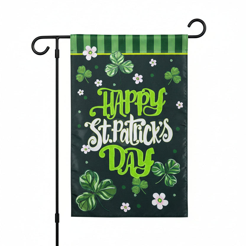 Evergreen Happy St. Patrick's Day St. Patrick's Day shamrocks applique flag with clovers and flowers on a green background and text saying "Happy St. Patrick's Day." Flag is shown on a white background.