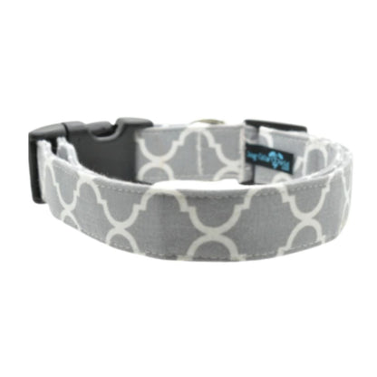 Gray quarter dog collar with a black buckle on a white background