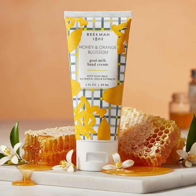 Beekman 1802 hand cream tube with yellow floral design