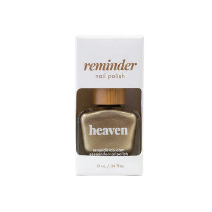 Reminder Nail Polish in Heaven shimmering gold on a white background.