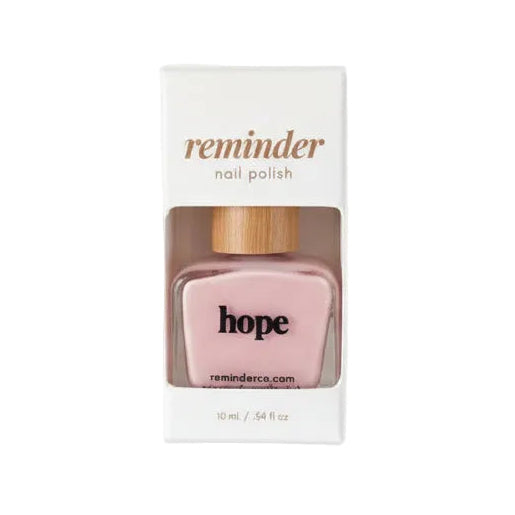 Reminder Nail Polish in Hope Light Pink on white background.