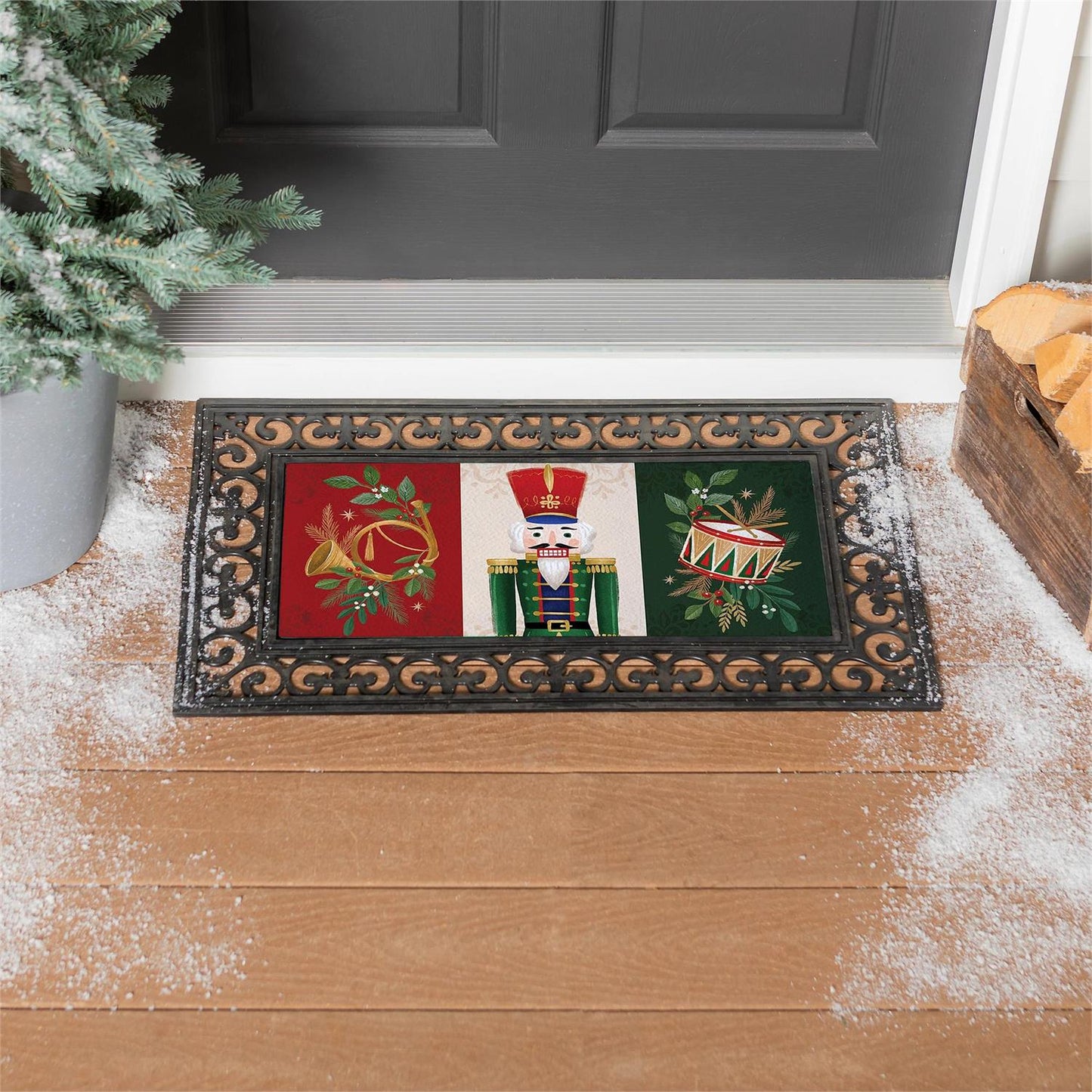 Decorative doormat with Christmas design featuring a horn, nutcracker, and drum on a wooden floor.