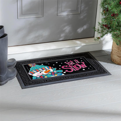 Decorative doormat with a snowman design and 'Let it Snow' text on a floor in front of a door.