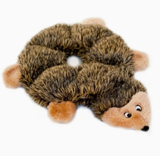 Plush dog toy resembling a hedgehog on a white background
