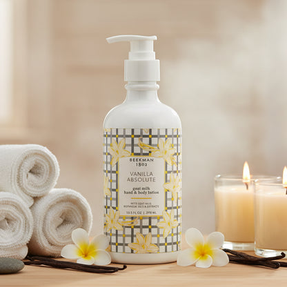 Bottle of Vanilla Absolute goat milk hand & body lotion with floral design